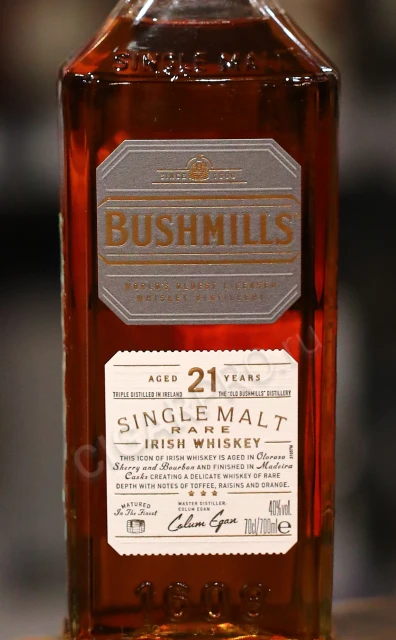 Этикетка Виски Бушмилз 21 лет 0.7л