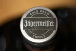 Логотип на крышке ликера Егермейстер Колд Брю Кофе 1л