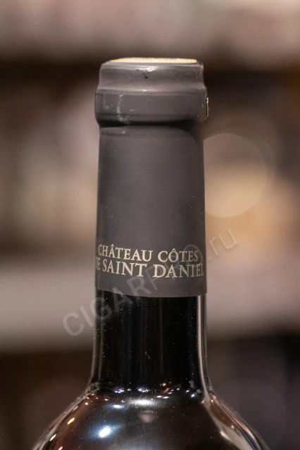Логотип на колпачке вина Шато Кот де Сант Даниел Трамонто 0.75л