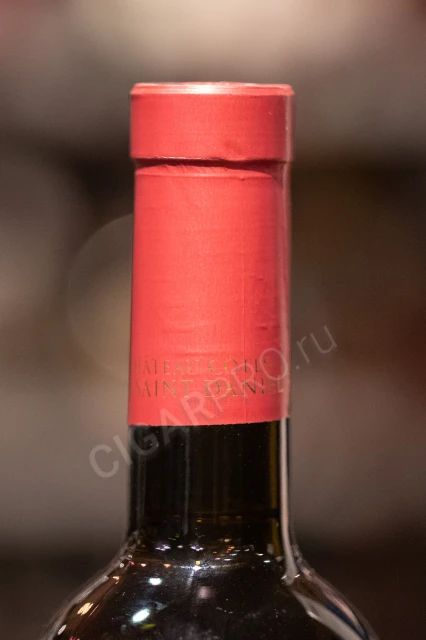 Логотип на колпачке вина Шато Кот де Сант Даниел Багряное Солнце 0.75л