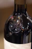 Логотип на бутылке вина Шато Валандро Премье Сент-Эмильон Гран Крю Классе 2013г 0.75л