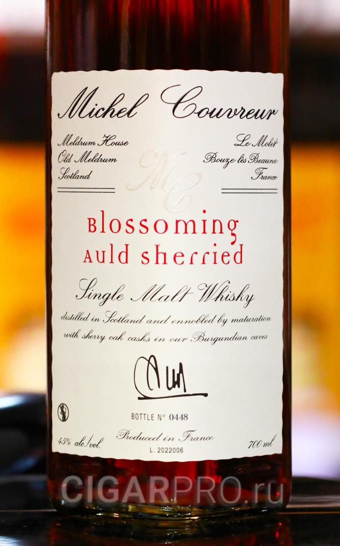 Имя на этикетке бутылки виски Michel Couvreur Clearach 